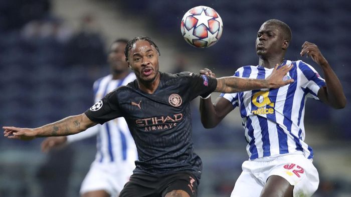 raheem sterling malang sarr fc porto manchester city liga champions porto vs manchester city Manchester Citys Raheem Sterling vies for the ball with Portos Malang Sarr, right, during the Champions League group C soccer match between FC Porto and Manchester City at the Dragao stadium in Porto, Portugal, Tuesday, Dec. 1, 2020. (AP Photo/Luis Vieira)