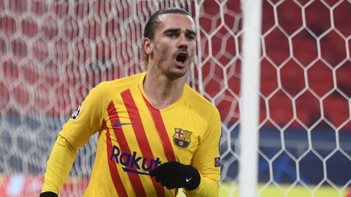 Barcelonas French forward Antoine Griezmann celebrates scoring during the UEFA Champions League football match Ferencvaros TC v FC Barcelona in Budapest on December 2, 2020. (Photo by Attila KISBENEDEK / AFP)