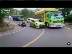 Viral Nyalip di Tikungan Berujung Celaka, Pahami Marka Garis Utuh