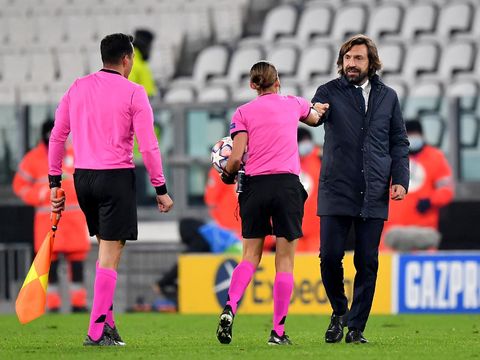 TURIN, ITALY - DECEMBER 02: Match Referee Stephanie Frappart(2R) and Andrea Pirlo, Head Coach of Juventus embrace at the final whistle during the UEFA Champions League Group G stage match between Juventus and Dynamo Kyiv at Allianz Stadium on December 02, 2020 in Turin, Italy. Sporting stadiums around Italy remain under strict restrictions due to the Coronavirus Pandemic as Government social distancing laws prohibit fans inside venues resulting in games being played behind closed doors. (Photo by Valerio Pennicino/Getty Images)