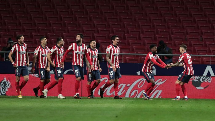 MADRID, SPAIN - DECEMBER 05: Thomas Lemar of Atletico de Madrid celebrates scoring his sides first goal during the La Liga Santander match between Atletico de Madrid and Real Valladolid CF at Estadio Wanda Metropolitano on December 05, 2020 in Madrid, Spain. Football Stadiums around Spain remain empty due to the Coronavirus Pandemic as Government social distancing laws prohibit fans inside venues resulting in fixtures being played behind closed doors. (Photo by Gonzalo Arroyo Moreno/Getty Images)