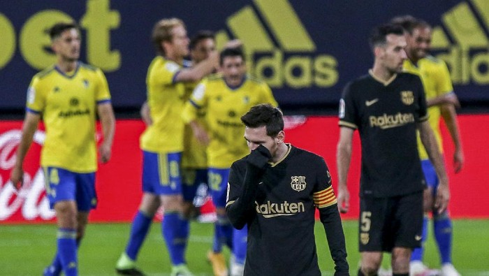 Barcelonas Lionel Messi reacts after Cadiz scored a goal during the Spanish La Liga soccer match between Cadiz and FC Barcelona at the Ramon Carranza stadium in Cadiz, Spain, Saturday Dec. 5, 2020. (AP Photo/Alvaro Rivero)