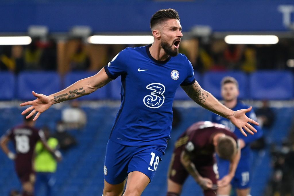 LONDON, ENGLAND - DECEMBER 05: Olivier Giroud of Chelsea celebrates after scoring their team's first goal during the Premier League match between Chelsea and Leeds United at Stamford Bridge on December 05, 2020 in London, England. A limited number of fans are welcomed back to stadiums to watch elite football across England. This was following easing of restrictions on spectators in tiers one and two areas only. (Photo by Daniel Leal-Olivas - Pool/Getty Images)