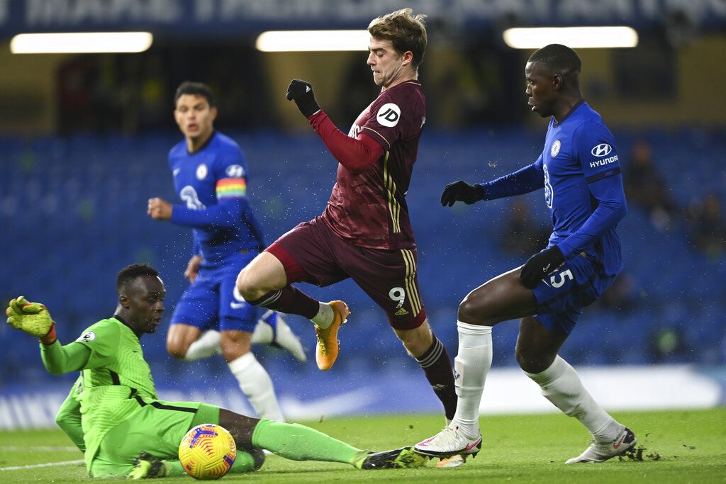 Chelsea's goalkeeper Edouard Mendy saves a shot during the English Premier League soccer match between Chelsea and Tottenham Hotspur at Stamford Bridge in London, England, Sunday, Nov. 29, 2020. (Justin Tallis/Pool via AP)