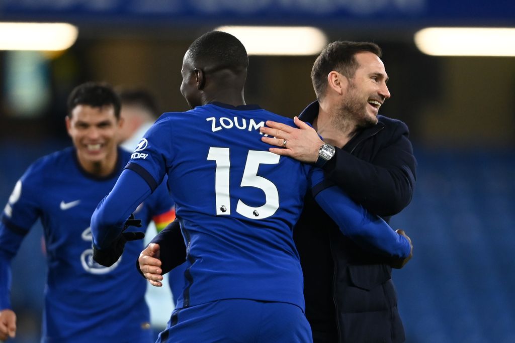 LONDON, ENGLAND - DECEMBER 05: Frank Lampard, Manager of Chelsea reacts with Kurt Zouma following the Premier League match between Chelsea and Leeds United at Stamford Bridge on December 05, 2020 in London, England. A limited number of fans are welcomed back to stadiums to watch elite football across England. This was following easing of restrictions on spectators in tiers one and two areas only. (Photo by Mike Hewitt/Getty Images)