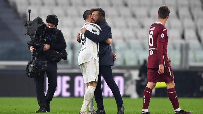 TURIN, ITALY - DECEMBER 05: Leonardo Bonucci of Juventus celebrates with Head Coach Andrea Pirlo after the Serie A match between Juventus and Torino FC at Allianz Stadium on December 05, 2020 in Turin, Italy. Football Stadiums around Italy remain empty due to the Coronavirus Pandemic as Government social distancing laws prohibit fans inside venues resulting in fixtures being played behind closed doors. (Photo by Valerio Pennicino/Getty Images)