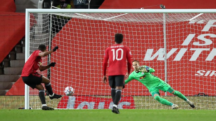MANCHESTER, ENGLAND - OCTOBER 28: Anthony Martial of Manchester United scores his sides fourth goal from the penalty spot past Peter Gulacsi of RB Leipzig during the UEFA Champions League Group G stage match between Juventus and FC Barcelona at Juventus Stadium on October 28, 2020 in Turin, Italy. Sporting stadiums around Italy remain under strict restrictions due to the Coronavirus Pandemic as Government social distancing laws prohibit fans inside venues resulting in games being played behind closed doors. (Photo by Clive Brunskill/Getty Images)