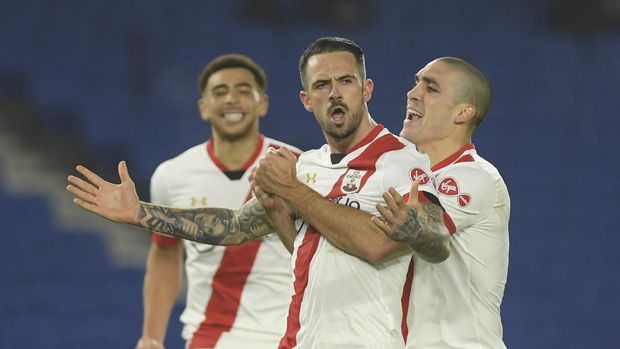 Southampton's Danny Ings celebrates after scoring his side's second goal during the English Premier League soccer match between Brighton and Hove Albion and Southampton in Brighton, England, Monday, Dec. 7, 2020. (Mike Hewitt/Pool Via AP)