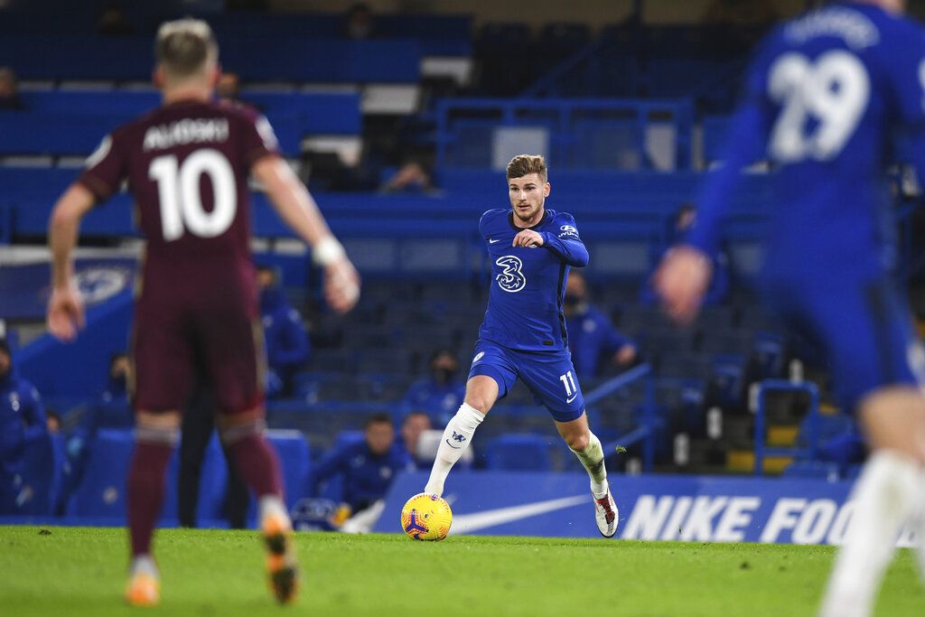 Chelsea's Timo Werner, center, controls the ball during the English Premier League soccer match between between Chelsea and Leeds United at Stamford Bridge in London, England, Saturday, Dec. 5, 2020. (Daniel Leal-Olivas/Pool via AP)