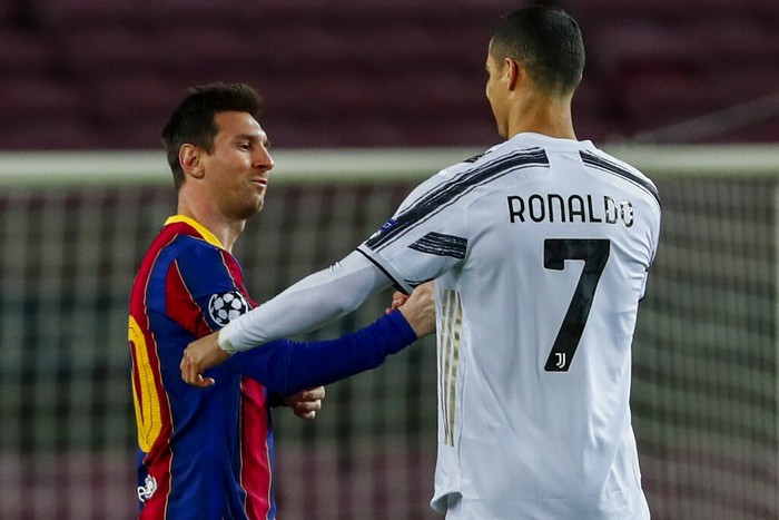 Cristiano Ronaldo Barcelona's Lionel Messi, left, shakes has with Juventus' Cristiano Ronaldo prior of the start of the Champions League group G soccer match between FC Barcelona and Juventus at the Camp Nou stadium in Barcelona, Spain, Tuesday, Dec. 8, 2020. (AP Photo/Joan Monfort)
