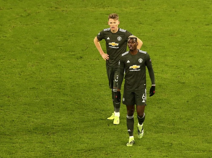 Manchester Uniteds Paul Pogba leaves the field after the Champions League group H soccer match between RB Leipzig and Manchester United at the RB Arena in Leipzig, Germany, Tuesday, Dec. 8, 2020. (AP Photo/Matthias Schrader)