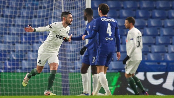 LONDON, ENGLAND - DECEMBER 08: Remy Cabella of FC Krasnodar celebrates after scoring their teams first goal during the UEFA Champions League Group E stage match between Chelsea FC and FC Krasnodar at Stamford Bridge on December 08, 2020 in London, England. A limited number of fans (2000) are welcomed back to stadiums to watch elite football across England. This was following easing of restrictions on spectators in tiers one and two areas only. (Photo by Catherine Ivill/Getty Images)