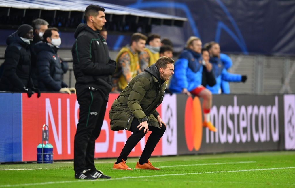 LEIPZIG, GERMANY - DECEMBER 08: Peter Gulacsi, Tyler Adams and Nordi Mukiele all of RB Leipzig celebrate following the UEFA Champions League Group H stage match between RB Leipzig and Manchester United at Red Bull Arena on December 08, 2020 in Leipzig, Germany. Sporting stadiums around Germany remain under strict restrictions due to the Coronavirus Pandemic as Government social distancing laws prohibit fans inside venues resulting in games being played behind closed doors. (Photo by Stuart Franklin/Getty Images)