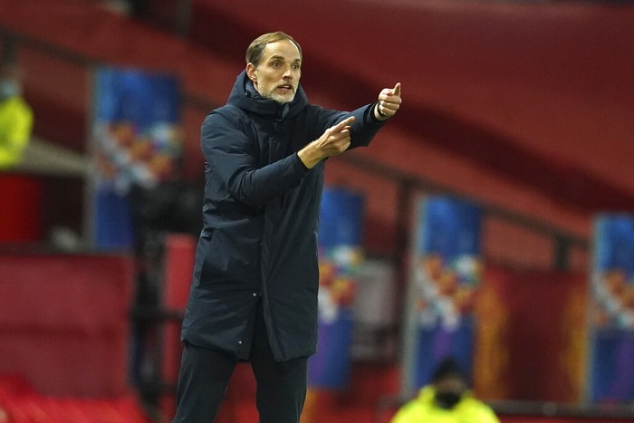 PSGs head coach Thomas Tuchel signals during a Group H Champions League soccer match between Manchester United and Paris Saint Germain at the Old Trafford stadium in Manchester, England, Wednesday, Dec. 2, 2020. (AP Photo/Dave Thompson)