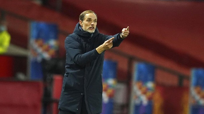 PSGs head coach Thomas Tuchel signals during a Group H Champions League soccer match between Manchester United and Paris Saint Germain at the Old Trafford stadium in Manchester, England, Wednesday, Dec. 2, 2020. (AP Photo/Dave Thompson)