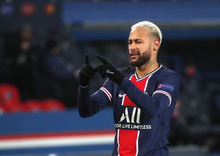 PSG's Neymar celebrates after scoring his side's fourth goal during the Champions League group H soccer match between Paris Saint Germain and Istanbul Basaksehir at the Parc des Princes stadium in Paris, France, Wednesday, Dec. 9, 2020. (AP Photo/Francois Mori)