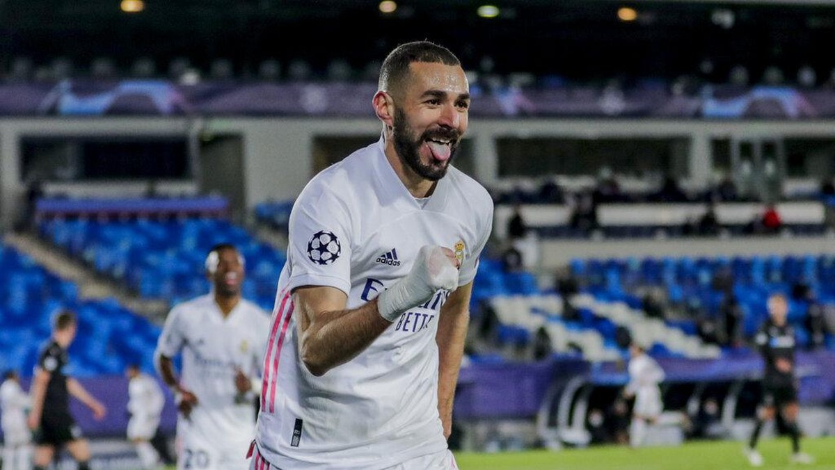 Karim Benzema menjadi juru selamat Real Madrid ke 16 besar Liga Champions (Foto: AP/Bernat Armangue)