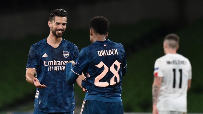 Arsenal DUBLIN, IRELAND - DECEMBER 10: Joe Willock of Arsenal celebrates after scoring their teams third goal Pablo Mari of Arsenal during the UEFA Europa League Group B stage match between Dundalk FC and Arsenal FC at Aviva Stadium on December 10, 2020 in Dublin, Ireland. The match will be played without fans, behind closed doors as a Covid-19 precaution. (Photo by Charles McQuillan/Getty Images)