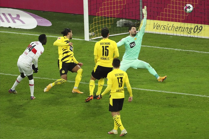 Stuttgarts Silas Wamangituka scores during the German Bundesliga soccer match between Borussia Dortmund and VfB Stuttgart in Dortmund, Germany, Saturday, Dec.12, 2020.  (Focke Strangmann/Pool via AP)