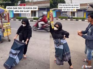 Jajan Es Pinggir Jalan Sambil Joget Pakai Sarung, Wanita Ini Bikin Ngakak