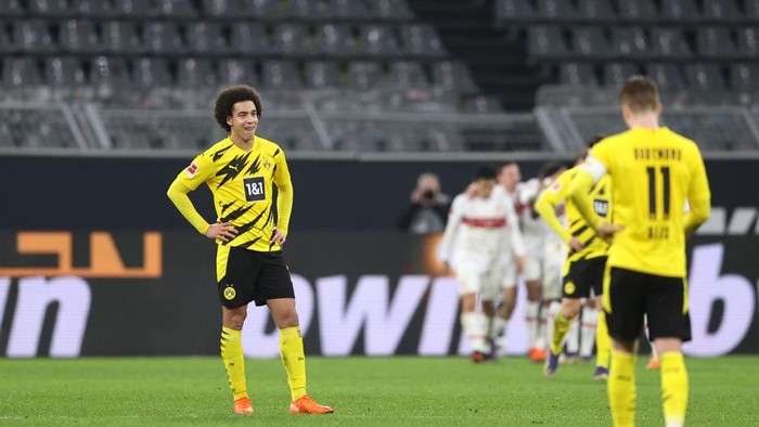 DORTMUND, GERMANY - DECEMBER 12: Axel Witsel of Borussia Dortmund looks dejected after his team concede a fifth goal during the Bundesliga match between Borussia Dortmund and VfB Stuttgart at Signal Iduna Park on December 12, 2020 in Dortmund, Germany. Sporting stadiums around Germany remain under strict restrictions due to the Coronavirus Pandemic as Government social distancing laws prohibit fans inside venues resulting in games being played behind closed doors. (Photo by Lars Baron/Getty Images)