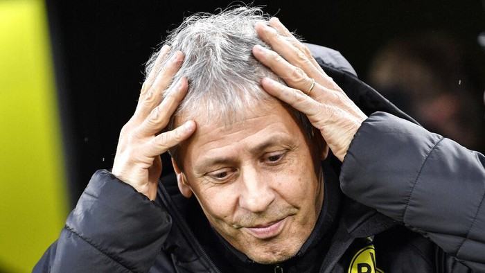 File---File picture taken Oct.19, 2019 shows Dortmunds head coach Lucien Favre beside the pitch prior the German Bundesliga soccer match between Borussia Dortmund and Borussia Moenchengladbach in Dortmund, Germany, Saturday Oct. 19, 2019. (AP Photo/Martin Meissner,file)