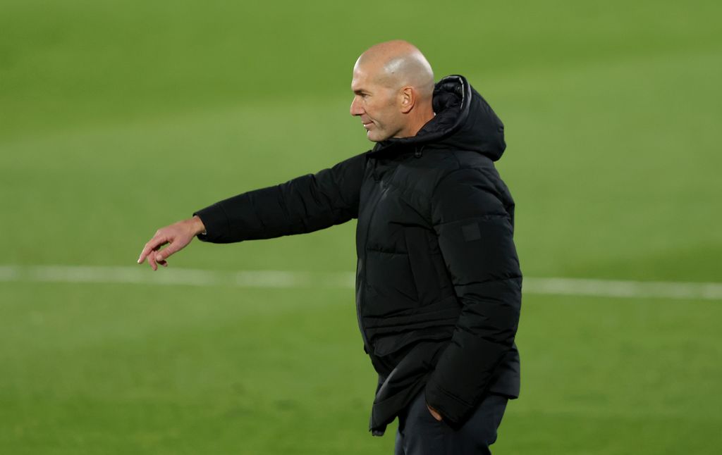 MADRID, SPAIN - DECEMBER 12: Zinedine Zidane, Head Coach of Real Madrid gives his team instructions during the La Liga Santander match between Real Madrid and Atletico de Madrid at Estadio Alfedo Di Stefano on December 12, 2020 in Madrid, Spain. Sporting stadiums around Spain remain under strict restrictions due to the Coronavirus Pandemic as Government social distancing laws prohibit fans inside venues resulting in games being played behind closed doors. (Photo by Angel Martinez/Getty Images)