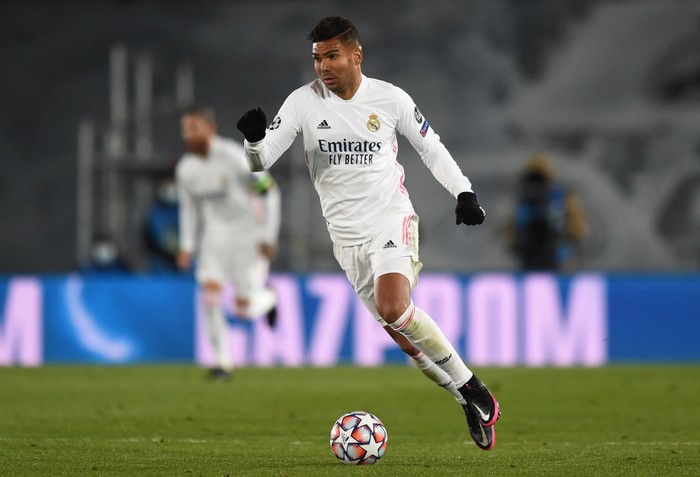 MADRID, SPAIN - DECEMBER 09:  Casemiro of Real Madrid controls the ball during the UEFA Champions League Group B stage match between Real Madrid and Borussia Moenchengladbach at Estadio Alfredo di Stefano on December 09, 2020 in Madrid, Spain. Sporting stadiums around Spain remain under strict restrictions due to the Coronavirus Pandemic as Government social distancing laws prohibit fans inside venues resulting in games being played behind closed doors. (Photo by Denis Doyle/Getty Images)