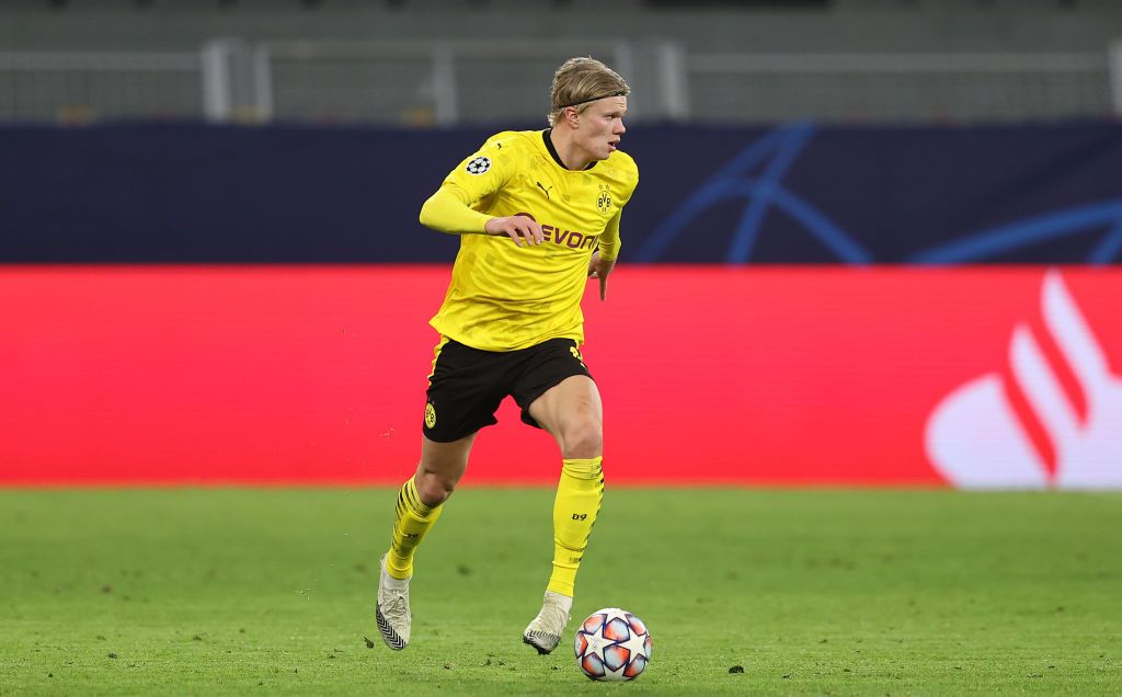 DORTMUND, GERMANY - NOVEMBER 24: Erling Haaland of Dortmund runs with the ball during the UEFA Champions League Group F stage match between Borussia Dortmund and Club Brugge KV at Signal Iduna Park on November 24, 2020 in Dortmund, Germany. (Photo by Lars Baron/Getty Images)