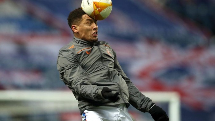 GLASGOW, SCOTLAND - DECEMBER 03: James Tavernier of Rangers heads the ball during his warm up prior to the UEFA Europa League Group D stage match between Rangers and Standard Liege at Ibrox Stadium on December 03, 2020 in Glasgow, Scotland. Sporting stadiums around the UK remain under strict restrictions due to the Coronavirus Pandemic as Government social distancing laws prohibit fans inside venues resulting in games being played behind closed doors. (Photo by Ian MacNicol/Getty Images)