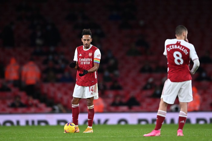 LONDON, ENGLAND - DECEMBER 13: Pierre-Emerick Aubameyang of Arsenal reacts after scoring an own goal during the Premier League match between Arsenal and Burnley at Emirates Stadium on December 13, 2020 in London, England. A limited number of spectators (2000) are welcomed back to stadiums to watch elite football across England. This was following easing of restrictions on spectators in tiers one and two areas only. (Photo by Laurence Griffiths/Getty Images)
