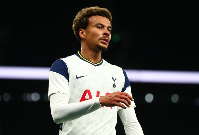 LONDON, ENGLAND - OCTOBER 01: Dele Alli of Tottenham Hotspur looks on during the UEFA Europa League play-off match between Tottenham Hotspur and Maccabi Haifa at Tottenham Hotspur Stadium on October 01, 2020 in London, England. Football Stadiums around Europe remain empty due to the Coronavirus Pandemic as Government social distancing laws prohibit fans inside venues resulting in fixtures being played behind closed doors. (Photo by Clive Rose/Getty Images)