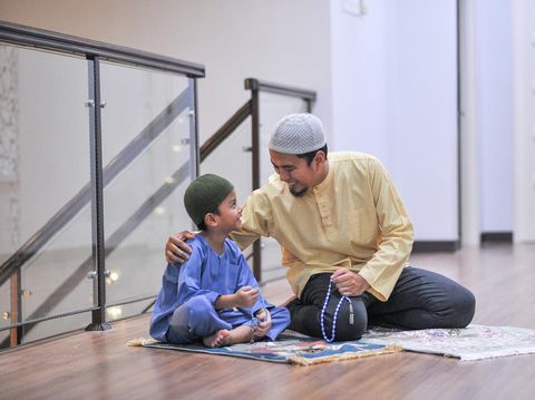 Muslim family worship during ramadhan