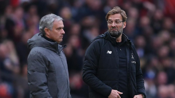 MANCHESTER, ENGLAND - MARCH 10:  Jose Mourinho of Manchester United and Jurgen Klopp of Liverpool look on during the Premier League match between Manchester United and Liverpool at Old Trafford on March 10, 2018 in Manchester, England.  (Photo by Laurence Griffiths/Getty Images)
