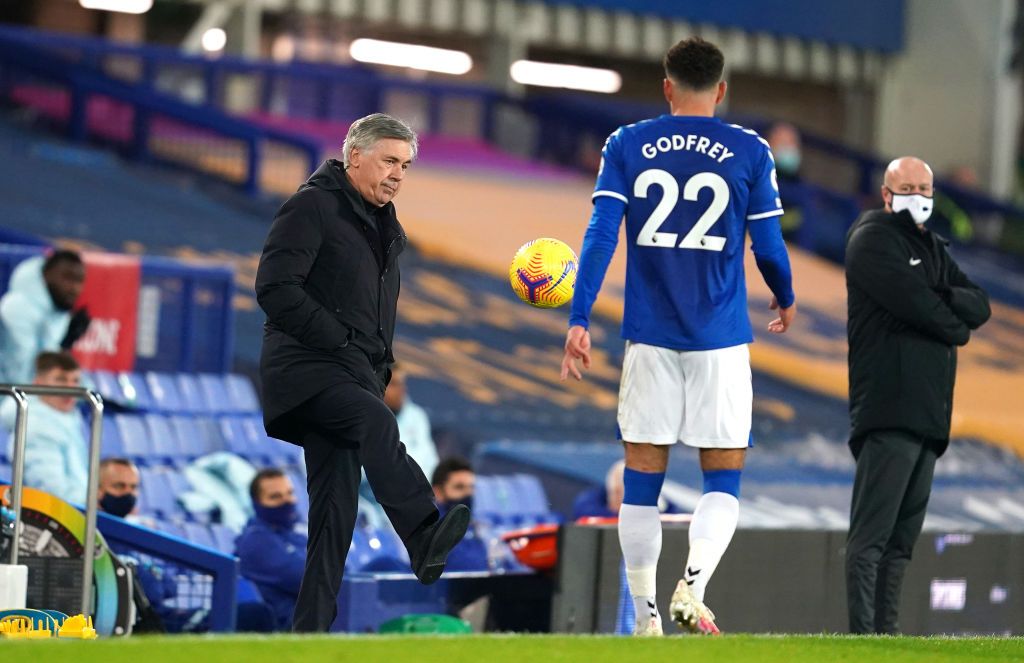 LEICESTER, ENGLAND - DECEMBER 16: Mason Holgate of Everton celebrates after scoring their sides second goal  during the Premier League match between Leicester City and Everton at The King Power Stadium on December 16, 2020 in Leicester, England. The match will be played without fans, behind closed doors as a Covid-19 precaution.  (Photo by Alex Pantling/Getty Images)