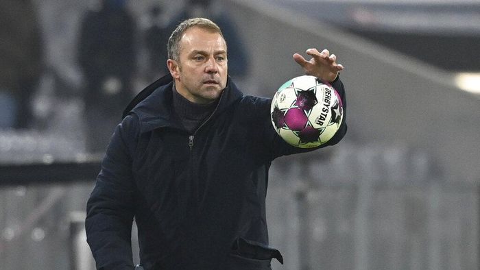 Hansi Flick Bayern coach Hansi Flick catches the match ball during a German Bundesliga soccer match between Bayern Munich and RB Leipzig in Munich, Germany, Saturday, Dec. 5, 2020. (Sven Hoppe/dpa via AP)