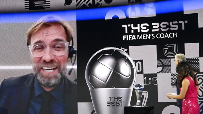 Juergen Klopp Liverpools manager Jurgen Klopp smiles after being awarded as Mens coach of the year during the Best FIFA Football Awards Ceremony in Zurich, Switzerland, Thursday, Dec. 17, 2020. (Valeriano Di Domenico/Pool via AP)