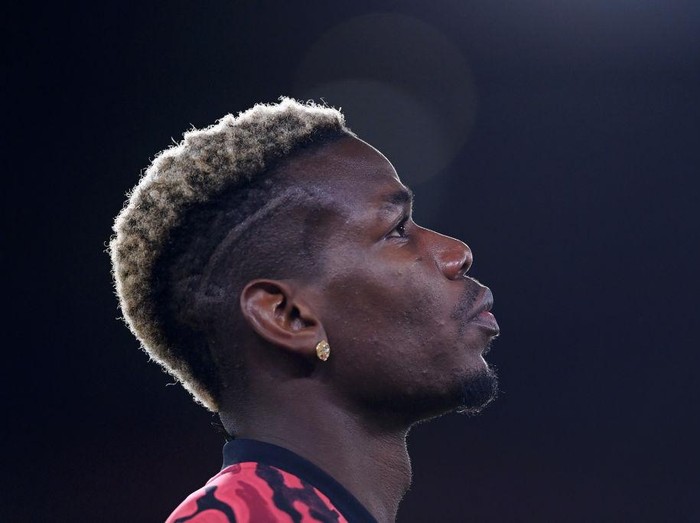 SHEFFIELD, ENGLAND - DECEMBER 17: Paul Pogba of Manchester United looks on ahead of the Premier League match between Sheffield United and Manchester United at Bramall Lane on December 17, 2020 in Sheffield, England. The match will be played without fans, behind closed doors as a Covid-19 precaution.  (Photo by Laurence Griffiths/Getty Images)