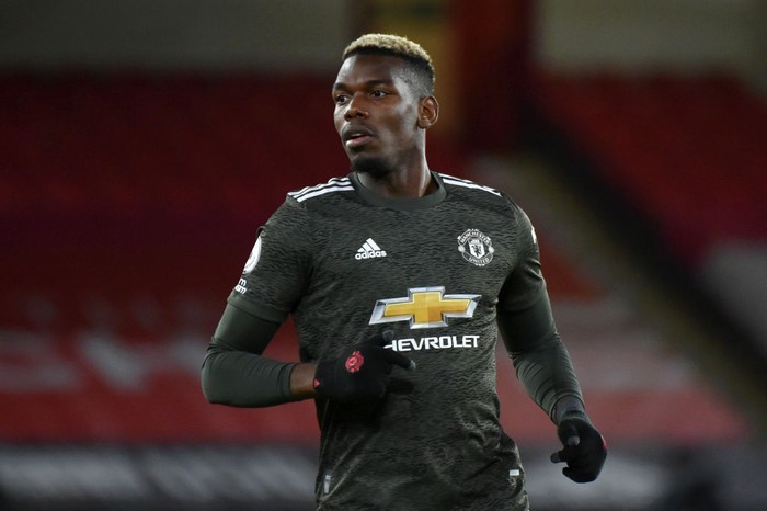 SHEFFIELD, ENGLAND - DECEMBER 17: Paul Pogba of Manchester United runs on during the Premier League match between Sheffield United and Manchester United at Bramall Lane on December 17, 2020 in Sheffield, England. The match will be played without fans, behind closed doors as a Covid-19 precaution.  (Photo by Rui Vieira - Pool/Getty Images)