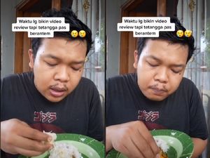 Pria tetap Fokus Review Makanan meski Tetangganya Sedang Adu Mulut