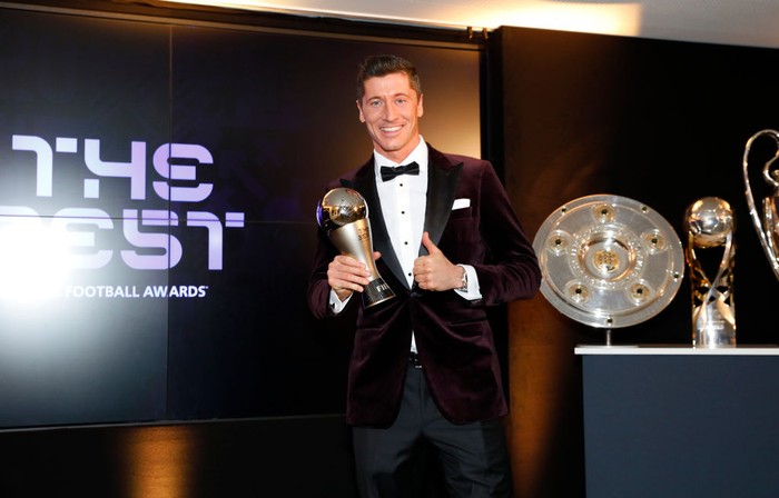 MUNICH, GERMANY - DECEMBER 17: Robert Lewandowski of FC Bayern Muenchen poses after winning the FIFA Mens Player 2020 trophy during the FIFA The BEST Awards ceremony on December 17, 2020 in Munich, Germany. (Photo by Pool/Marco Donato-FC Bayern/Pool via Getty Images)