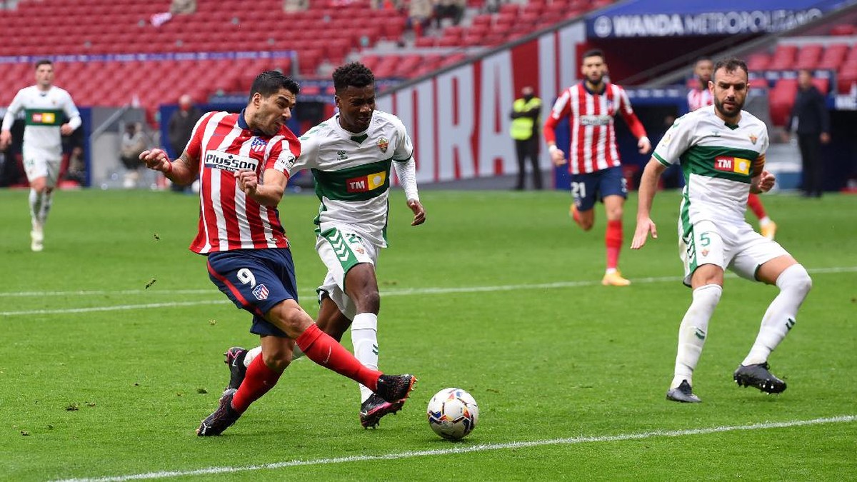 Luis Suarez menyumbang dua gol untuk Atletico Madrid di laga melawan Elche. (Foto: Getty Images/Denis Doyle)