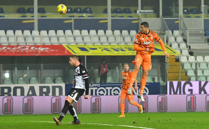 Cristiano Ronaldo PARMA, ITALY - DECEMBER 19: Cristiano Ronaldo of Juventus F.C. scores their team's second goal during the Serie A match between Parma Calcio and Juventus at Stadio Ennio Tardini on December 19, 2020 in Parma, Italy. Sporting stadiums around Italy remain under strict restrictions due to the Coronavirus Pandemic as Government social distancing laws prohibit fans inside venues resulting in games being played behind closed doors. (Photo by Alessandro Sabattini/Getty Images)