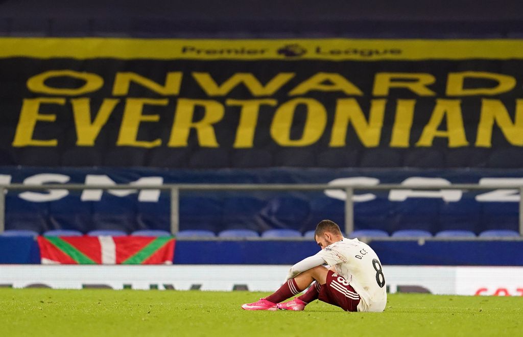 LIVERPOOL, ENGLAND - DECEMBER 19:  Dani Ceballos of Arsenal looks dejected following his sides defeat in the Premier League match between Everton and Arsenal at Goodison Park on December 19, 2020 in Liverpool, England. A limited number of fans (2000) are welcomed back to stadiums to watch elite football across England. This was following easing of restrictions on spectators in tiers one and two areas only. (Photo by Jon Super - Pool/Getty Images)