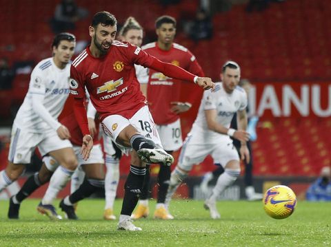 Manchester United's Bruno Fernandes scores his team's sixth goal from a penalty kick during an English Premier League soccer match between Manchester United and Leeds United at Old Trafford Stadium in Manchester, England, on Sunday 20 December 2020 ( Clive Brunskill / Pool via AP)