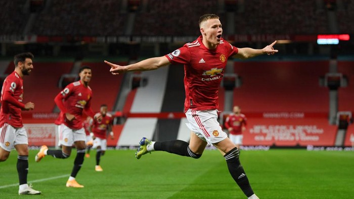 MANCHESTER, ENGLAND - DECEMBER 20: Scott McTominay of Manchester United celebrates after scoring their teams second goal  during the Premier League match between Manchester United and Leeds United at Old Trafford on December 20, 2020 in Manchester, England. The match will be played without fans, behind closed doors as a Covid-19 precaution. (Photo by Michael Regan/Getty Images)