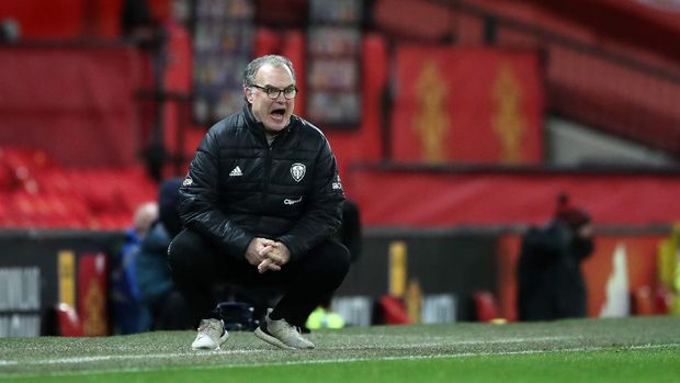 MANCHESTER, ENGLAND - DECEMBER 20: Marcelo Bielsa, Manager of Leeds United reacts during the Premier League match between Manchester United and Leeds United at Old Trafford on December 20, 2020 in Manchester, England. The match will be played without fans, behind closed doors as a Covid-19 precaution. (Photo by Nick Potts - Pool/Getty Images)