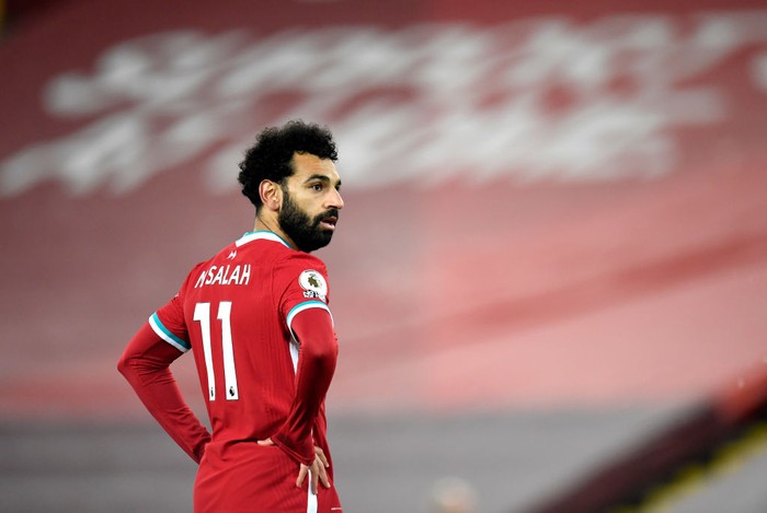LIVERPOOL, ENGLAND - DECEMBER 06: Mohamed Salah of Liverpool looks on during the Premier League match between Liverpool and Wolverhampton Wanderers at Anfield on December 06, 2020 in Liverpool, England. A limited number of fans (2000) are welcomed back to stadiums to watch elite football across England. This was following easing of restrictions on spectators in tiers one and two areas only. (Photo by Peter Powell - Pool/Getty Images)