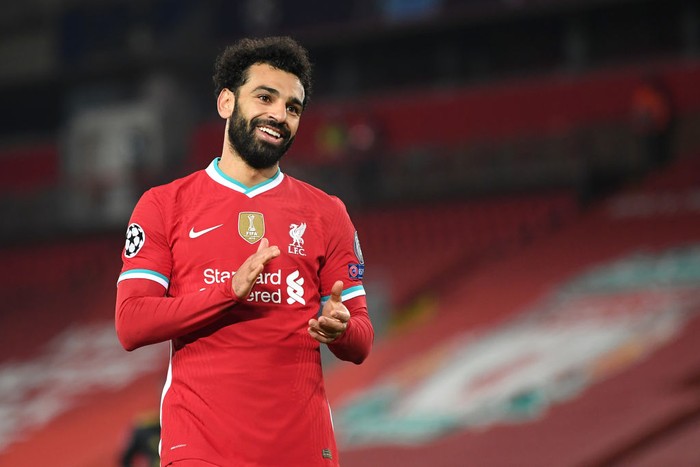 LIVERPOOL, ENGLAND - DECEMBER 01: Mohamed Salah of Liverpool reacts during the UEFA Champions League Group D stage match between Liverpool FC and Ajax Amsterdam at Anfield on December 01, 2020 in Liverpool, England. Sporting stadiums around the UK remain under strict restrictions due to the Coronavirus Pandemic as Government social distancing laws prohibit fans inside venues resulting in games being played behind closed doors. (Photo by Michael Regan/Getty Images)
