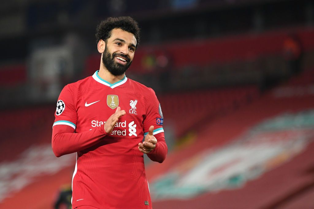 LIVERPOOL, ENGLAND - DECEMBER 1: Mohamed Salah of Liverpool reacts during the UEFA Champions League Group D stage match between Liverpool FC and Ajax Amsterdam at Anfield on December 1, 2020 in Liverpool, England.  Sports stadiums across the UK remain under strict restrictions due to the coronavirus pandemic, as the government's social distancing laws prohibit fans within venues, causing games to be played behind closed doors.  (Photo by Michael Regan / Getty Images)